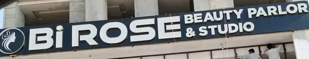 The Bi Rose Beauty Parlor & Studio sign on the plaza front
